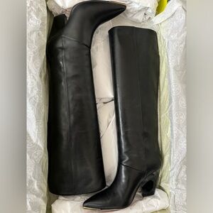Tory Burch knee high boots still in original box. Great condition.